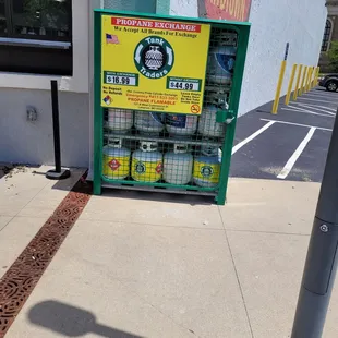 a vending machine on the sidewalk