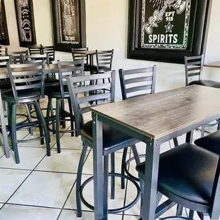 empty tables and chairs in a restaurant
