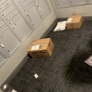Unsecured mail room (no door or access code required) where they throw packages on the floor.