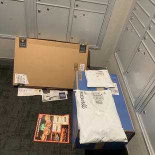 Unsecured mail room (no door or access code required) where they throw packages on the floor.