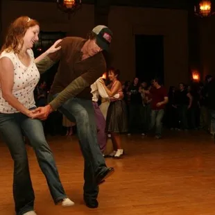a man and a woman dancing