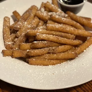 Funnel cake fries with raspberry sauce