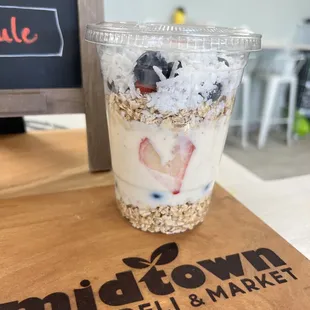 A yogurt parfait... granola, blueberries, strawberries, yogurt, and coconut flakes