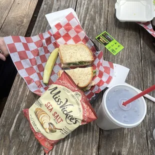 The Coach with sea salt chips and a dill pickle