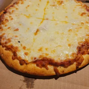 a cheese pizza in a box