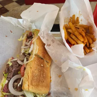 Combo sandwich with roast beef, corned beef plus garlic French  fries   BONUS  They fried the fries while I waited so they were fresh