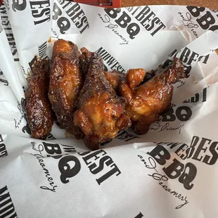 The "dillonator " wings. Smoked with a lemon pepper dry rub tossed in a sweet bbq
