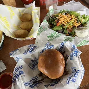 Brisket sandwich with small salad.
