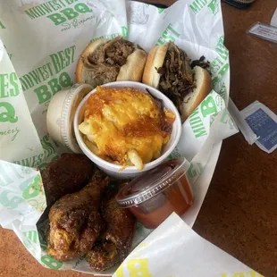 The MB Combo with MB's Mac and Cheese, Pulled Pork Sandwich, and Chopped Beef Brisket Sandwich.
