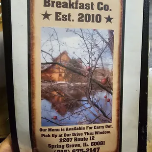 a person holding up a poster