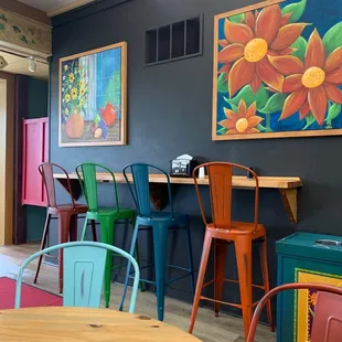 colorful chairs and artwork