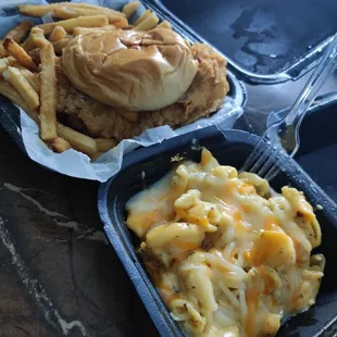 a chicken sandwich and macaroni and cheese fries