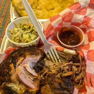 Pulled pork, smoked chicken, Navajo pita and curry slaw.