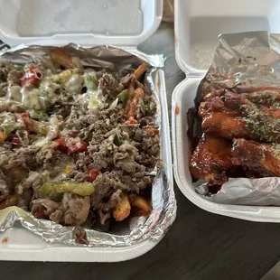 Philly cheesesteak loaded fries and bbq wings