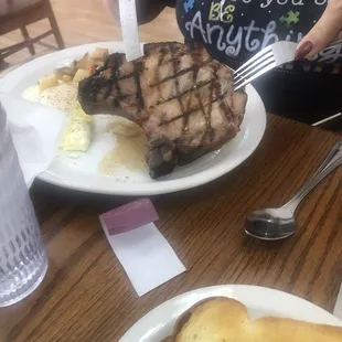 Breakfast smoked pork chop and eggs home fries . 11/9/22