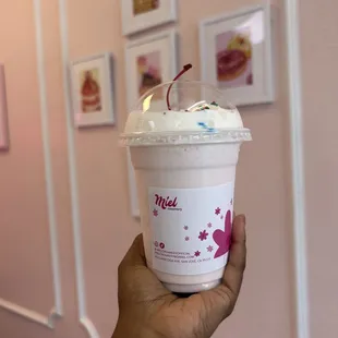 Cotton candy milkshake with sprinkles and cherry ( from build your own menu )