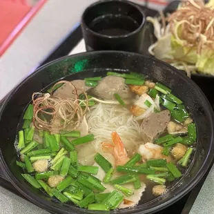 a bowl of soup and a bowl of noodles