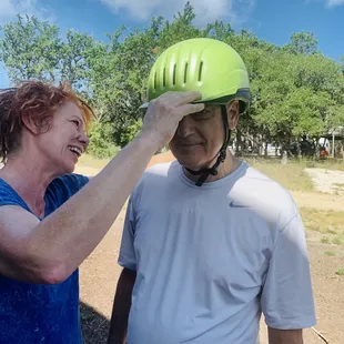 My boyfriend having his helmet properly fitted during our lesson at Miercoles Moon.