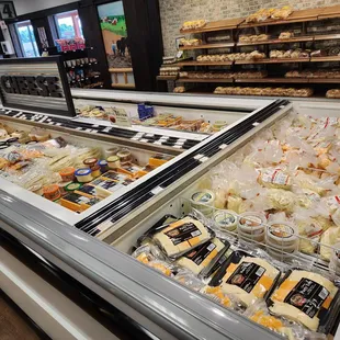 a display of cheeses and pastries