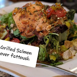 Grilled salmon over fattoush