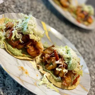 two tacos on a plate