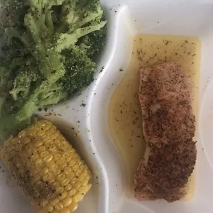 Salmon, corn and broccoli. This was a takeout. It was not worth it. I had more broccoli then salmon.