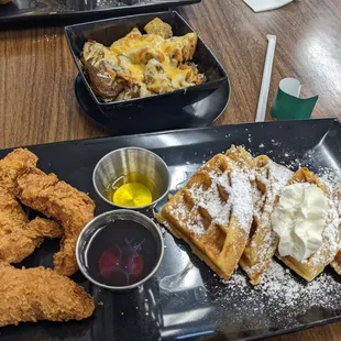 December 2021; regular waffle and 3 tenders ($16); side of potatoes with added cheese and bacon ($6.50); very good and surprisingly filling.