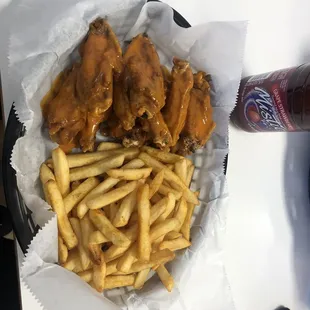 12 wings: hot + French fries.  Grape mystic.  So good.