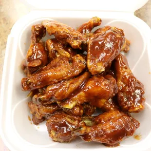 a closeup of the wings in a styrofoam container