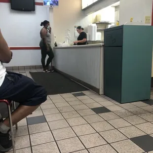 a man in a wheelchair in a diner