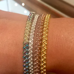 Love these beautiful bracelets designed by her son!