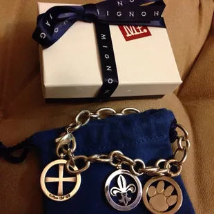 One of my Mignon Faget charm bracelets (have the other plain silver bracelet). Every 5lbs I lose I get another charm!