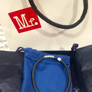 Treated myself after losing weight to the black John Humphries bracelet to match my gold one! Getting ready for Saints season!