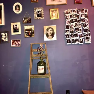 a ladder leaning against a purple wall