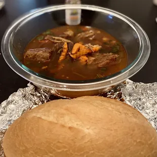 Beef stew (take out, taken at home) with a baguette