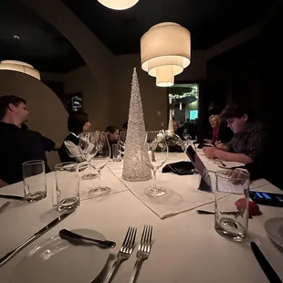 people sitting at a table in a restaurant
