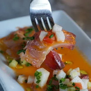 a plate of food with a fork