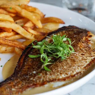 a plate of fish and french fries