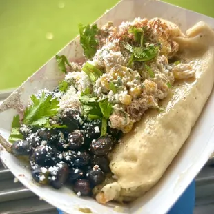 Vegetarian plate! Green chile cheese tamale with beans and esquites!