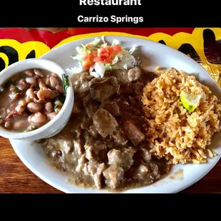 Carne Guisada plate.