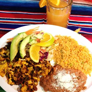 Breakfast Chorizo and eggs, rice and beans.