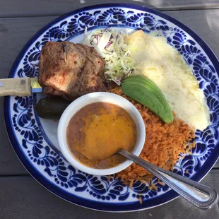 Carne Asada plate with cheese enchilada