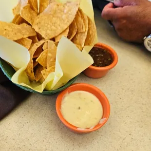 Chips with salsa and queso dip