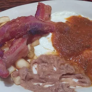 Heuvos rancheros. I was so hungry that I already ate some beans.