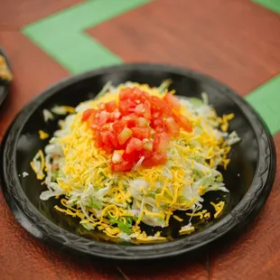 a plate of taco and chips