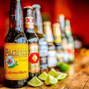 bottles of beer and limes