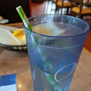 Water with a PAPER straw.