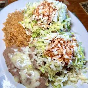 Two homemade toastadas with your choice of beef, pork, or chicken. Includes rice and choice of beans.