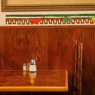 a table with salt and pepper shakers