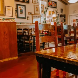 a wooden table and chairs